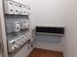 Risanamento dell’intonaco dei locali tecnici condominiali e Rifacimento del parapetto di due balconi di una unità abitativa. - Locale contatori post intervento.