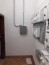 Risanamento dell’intonaco dei locali tecnici condominiali e Rifacimento del parapetto di due balconi di una unità abitativa. - Locale contatori post-intervento.