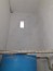 Risanamento dell’intonaco dei locali tecnici condominiali e Rifacimento del parapetto di due balconi di una unità abitativa. - Locale autoclave post-intervento.