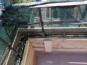 Risanamento dell’intonaco dei locali tecnici condominiali e Rifacimento del parapetto di due balconi di una unità abitativa. - Rifacimento del parapetto del balcone con cordolo in c.a.